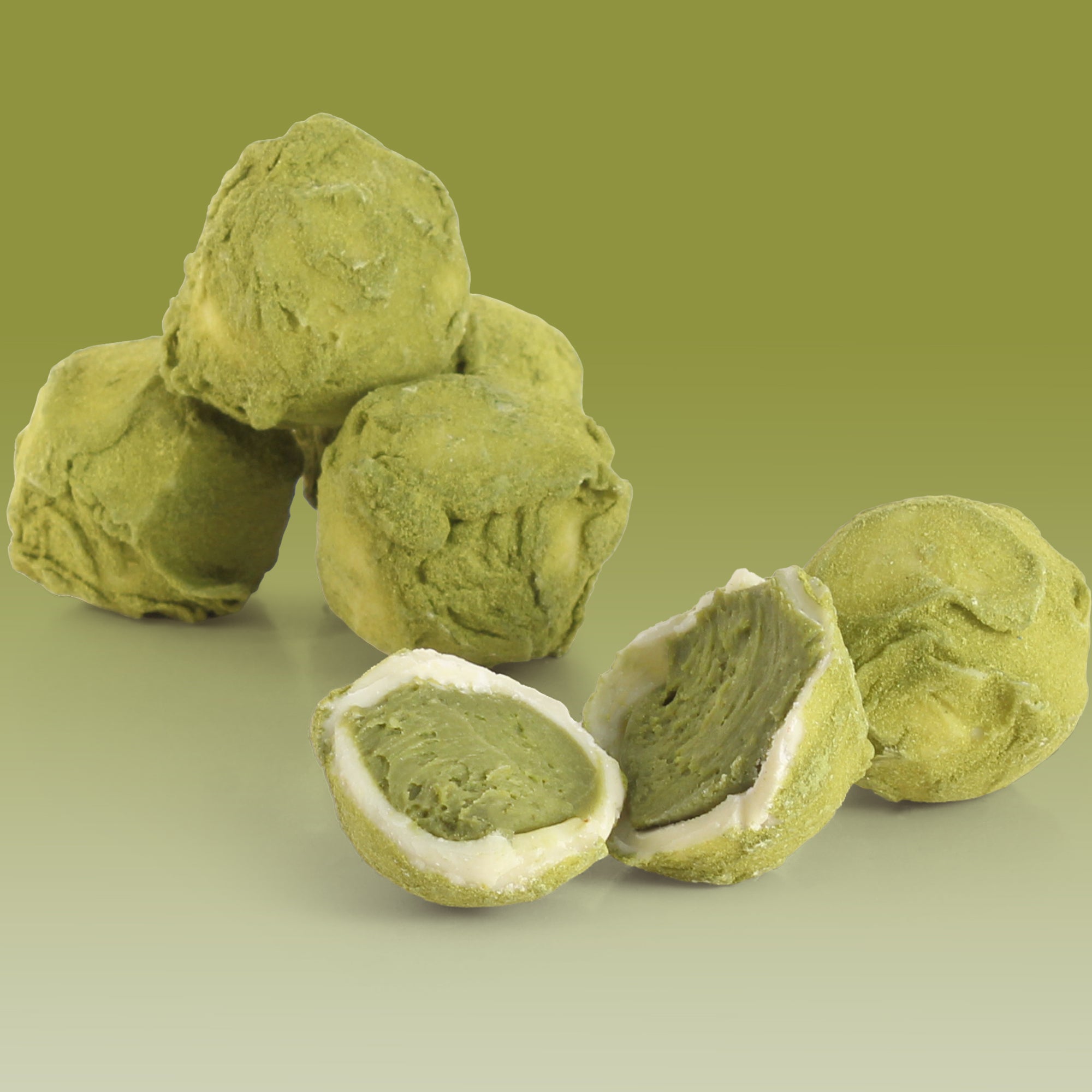 A Friars of Keswick matcha truffle, dark chocolate shell with bright green ceremonial-grade matcha ganache inside.